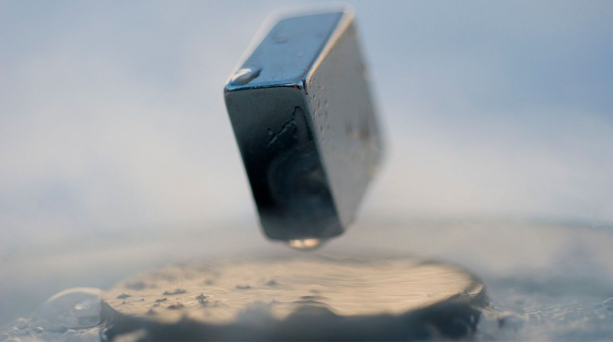 Levitation of a magnet on top of a superconductor