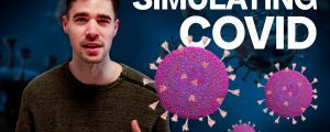 Marc Domingo besides a Coronavirus simulation with the text: "Simulating COVID"